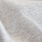 Preston Birch performance fabric, a light cream fabric, with strands of warm gray