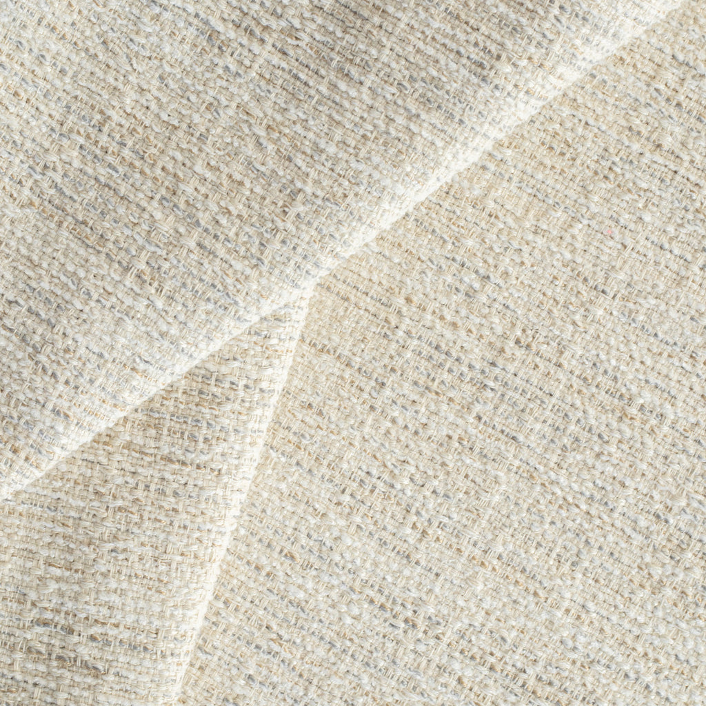 a beige upholstery fabric