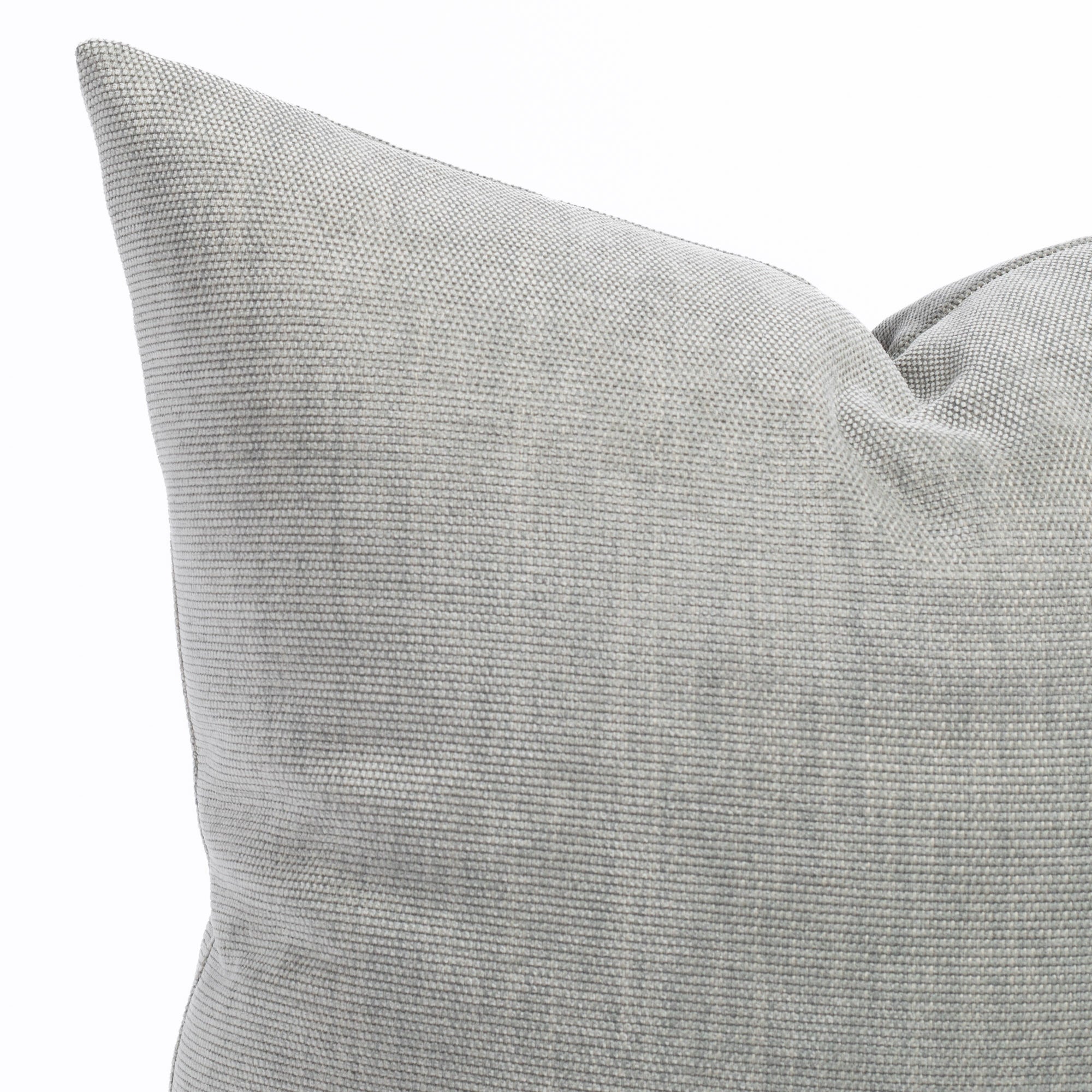 a soft light gray pillow : close up view 
