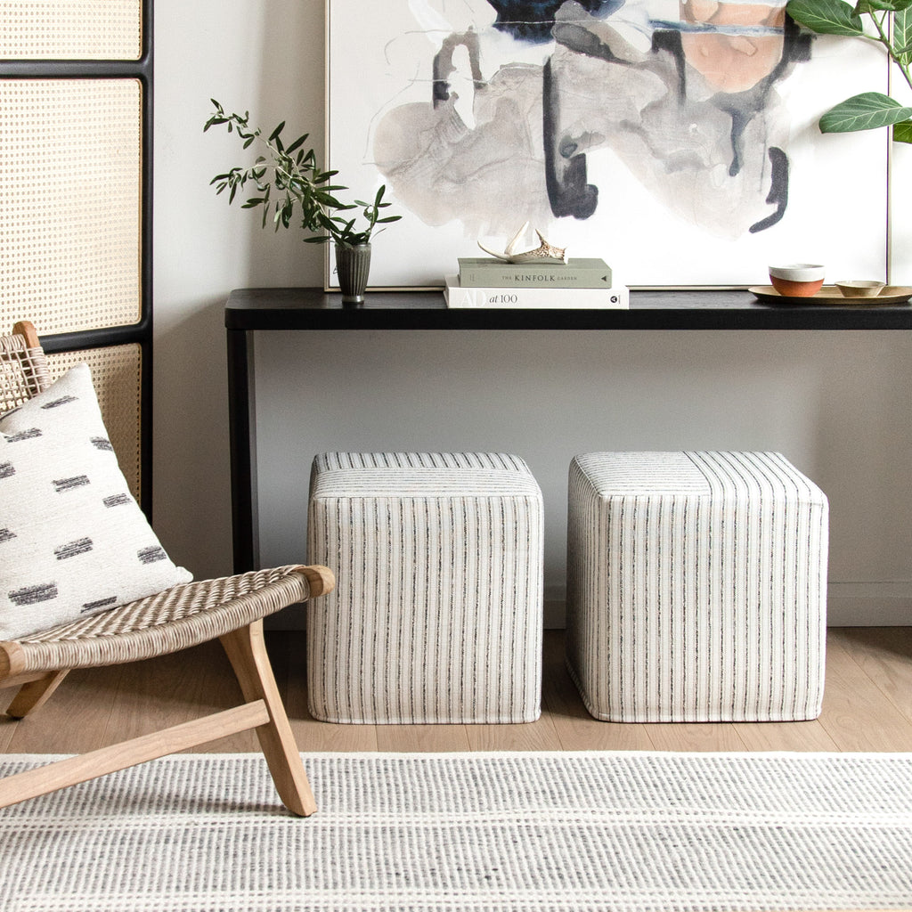 Neutral home decor from Tonic Living : Rodin Stripe Natural cube ottomans, Stratus cream and black pillow