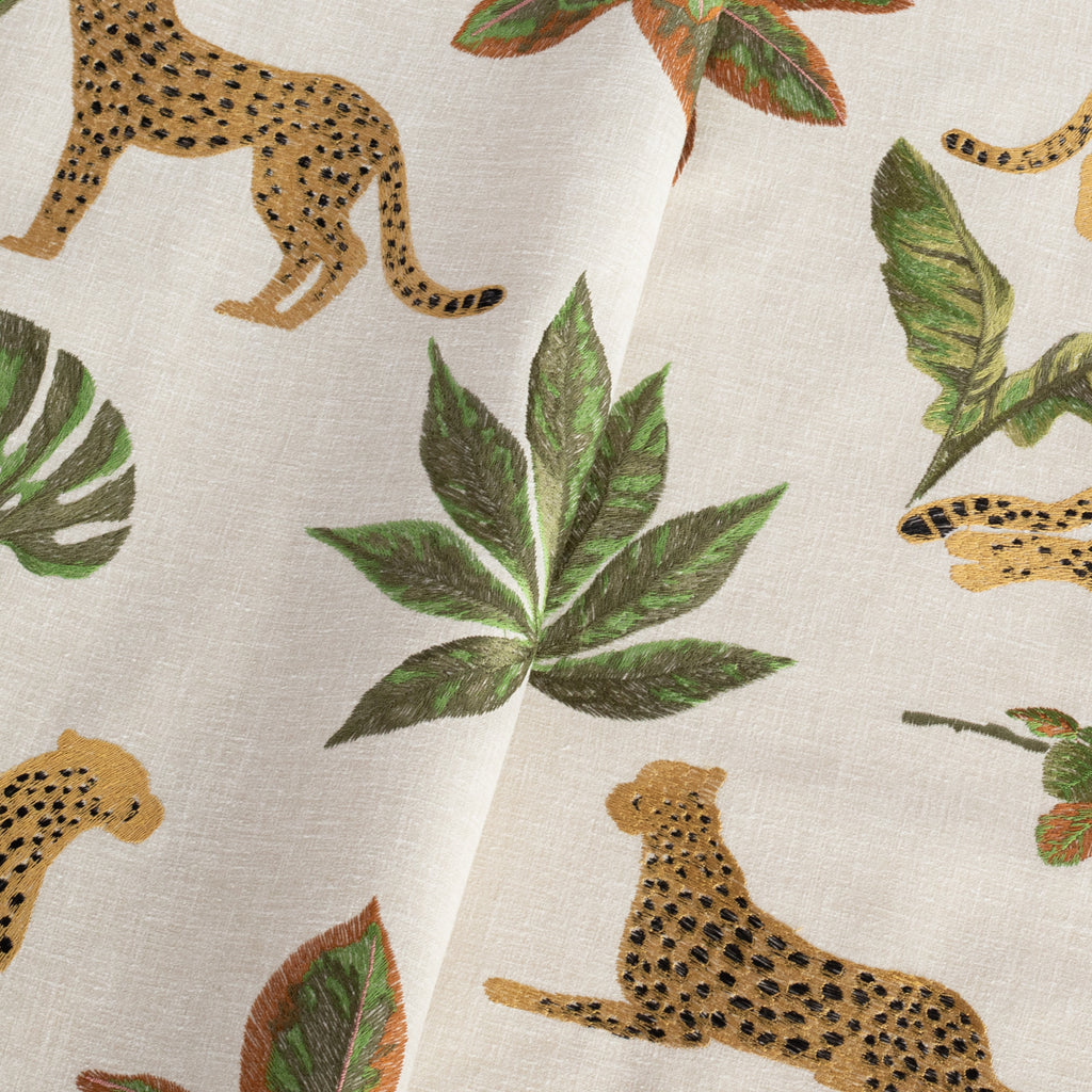 Savanna Topaz: a gold, black and green embroidered cheetah fabric from Tonic Living