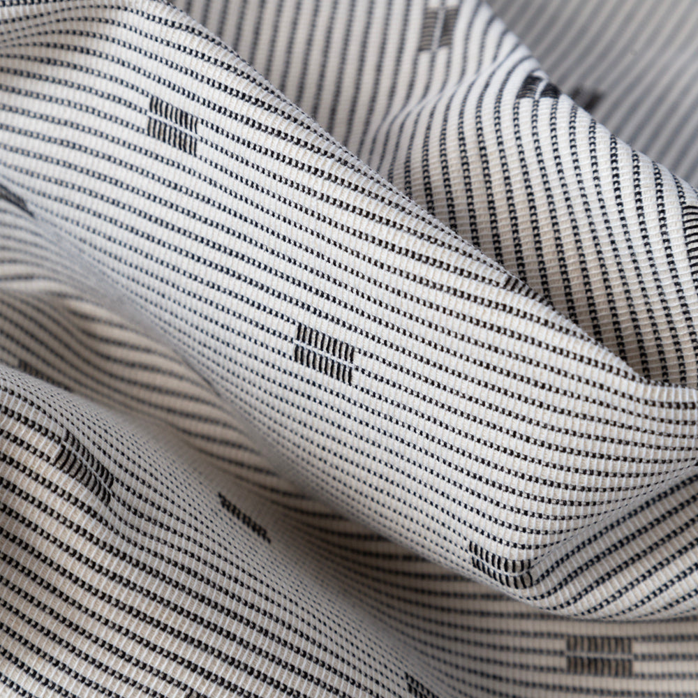 Slivio a modern cream and black geometric stripe fabric from Tonic Living