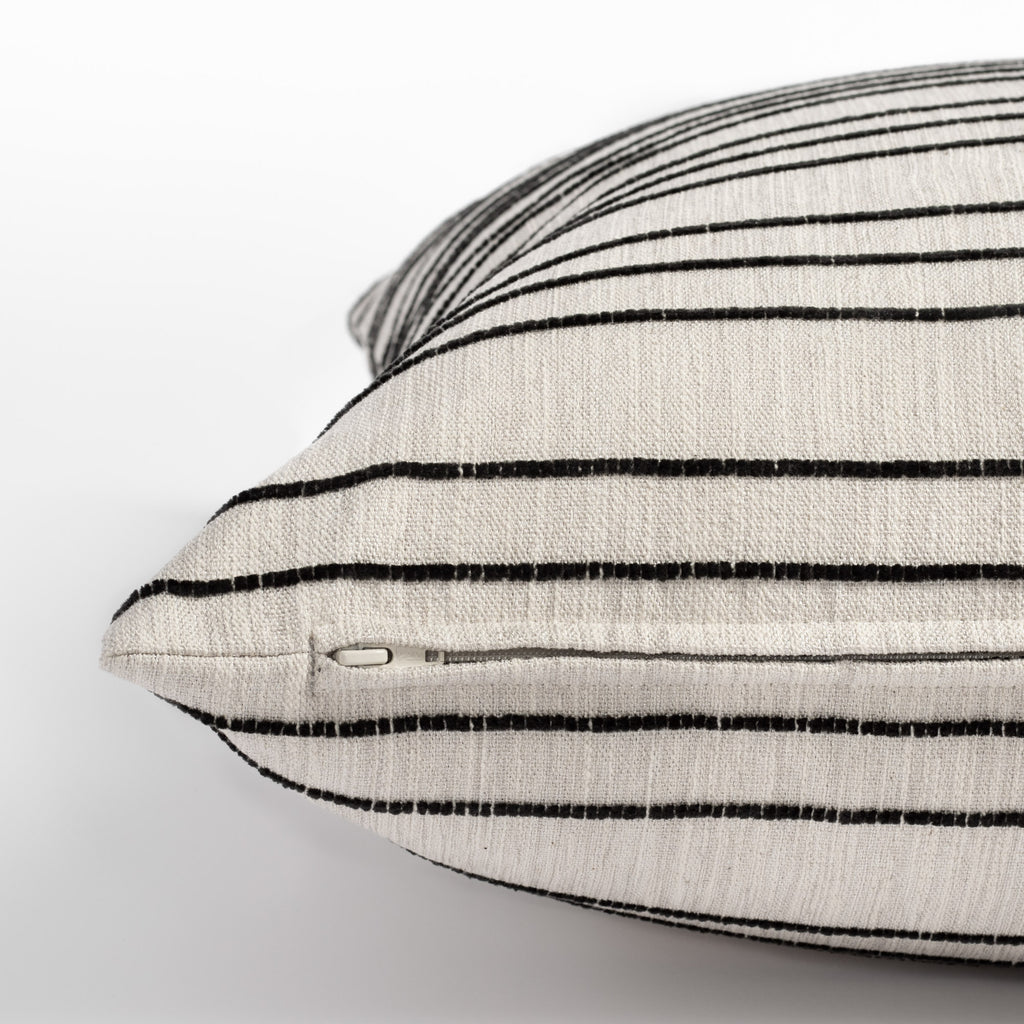 Spar Stripe Pillow, a cream and black horizontal stripe pillow : close up zipper side