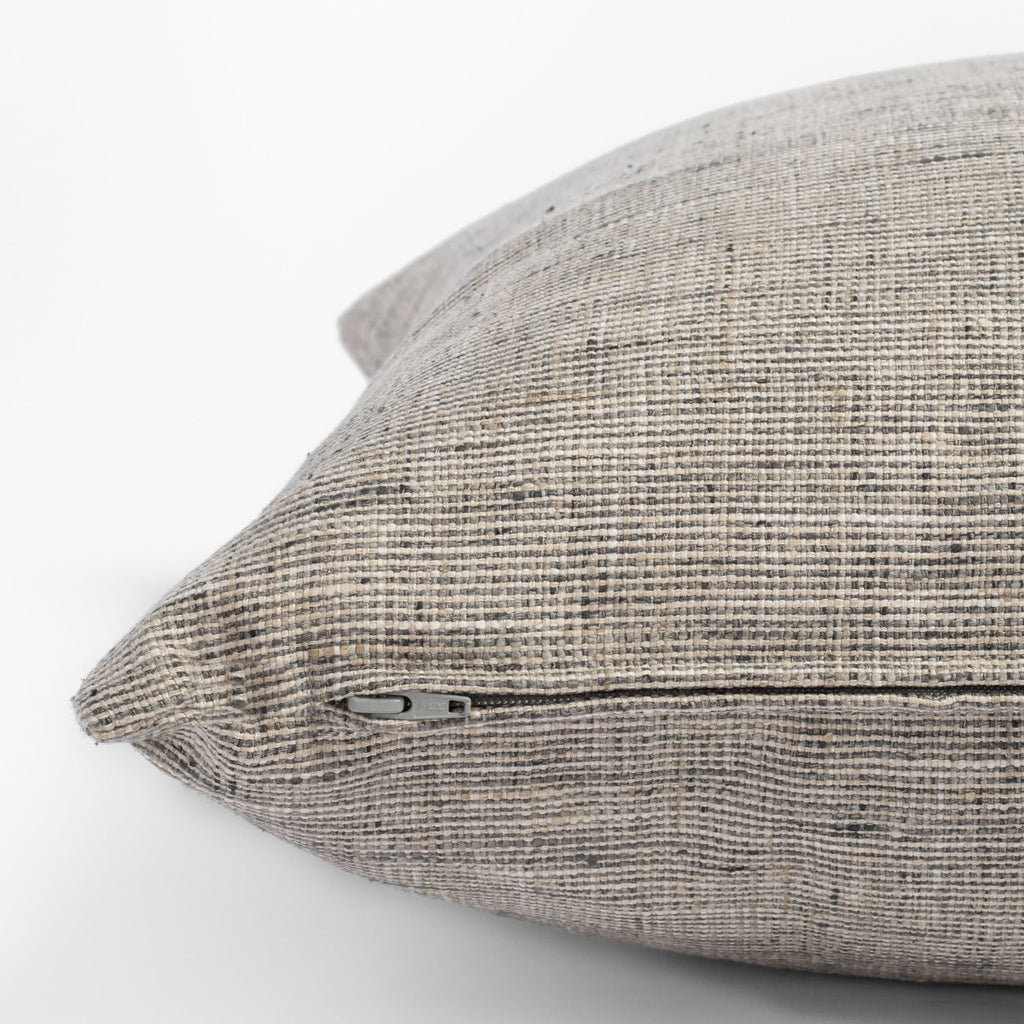 Stanhope Ash, a warm gray neutral pillow : close up zipper view