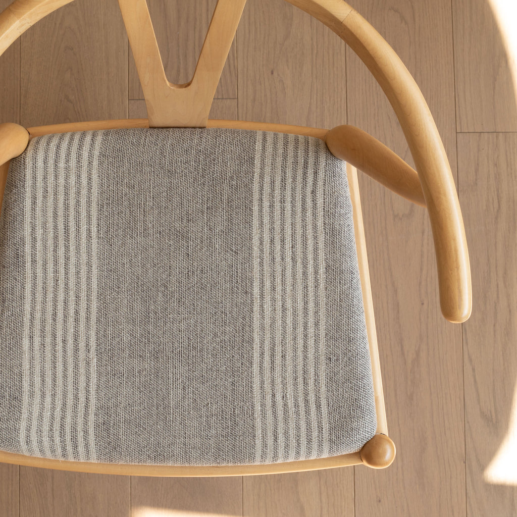 a gray and cream stripe upholstered chair seat