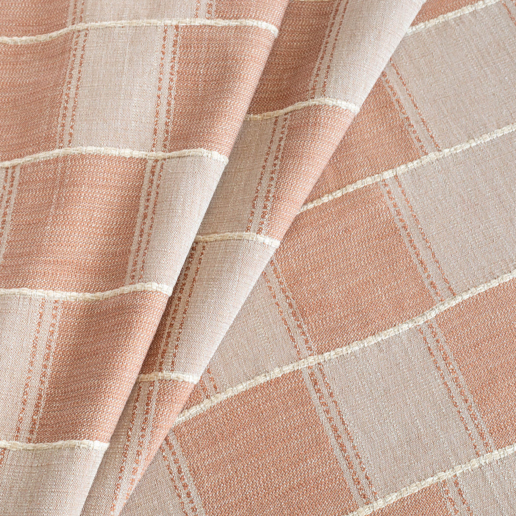 a sand and terracotta patchwork pattern with a chunky burlap stitched horizontal stripe upholstery fabric