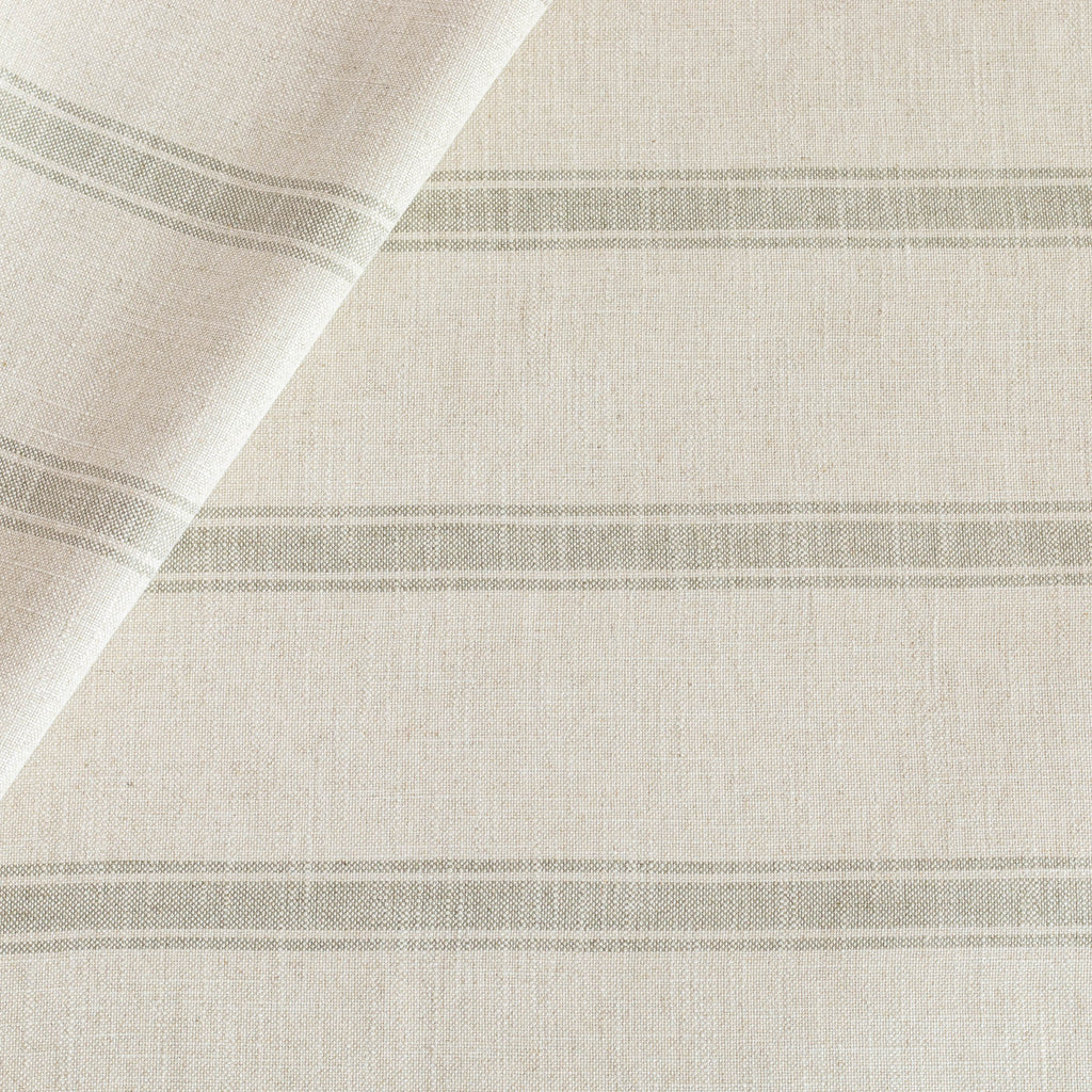a watery blue and cream stripe upholstery fabric from Tonic Living 