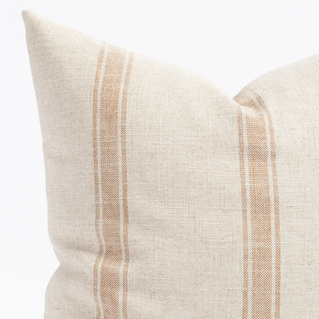 a cream and faded rust stripe throw pillow : close up view