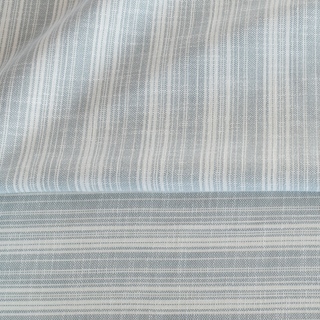 Trouville Sky Blue and white variegated stripe patterned indoor outdoor fabric : view 5