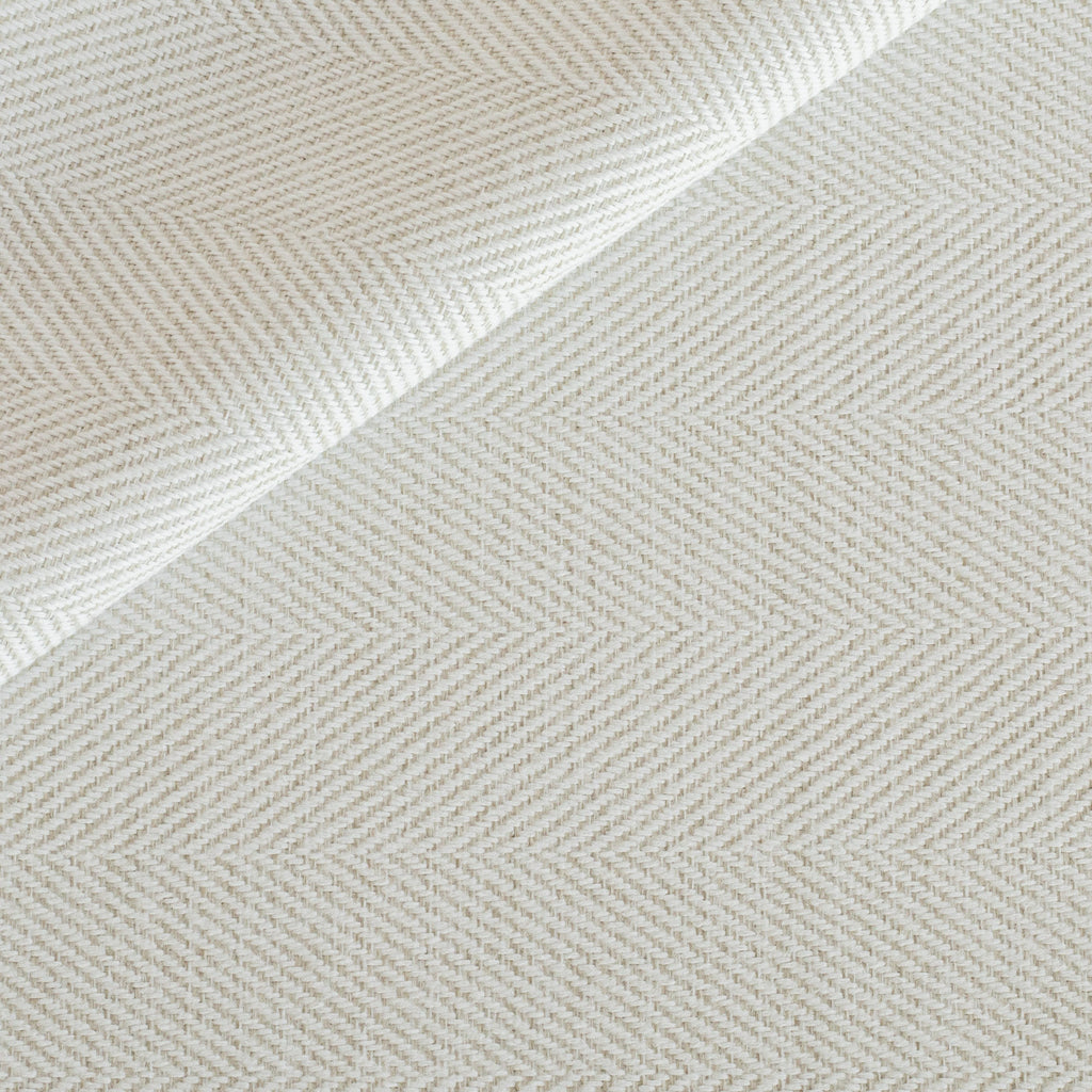 Weston Salt, a white and sandy cream herringbone weave high performance upholstery fabric from Tonic Living