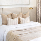 Neutral Bed pillow combination : Yarmouth Stripe Sandstone lumbars with Taryn Natural pillows and Lena Natural Throw blanket
