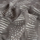 Zipporah Nickel, a dark gray upholstery fabric with cream dot dash motifs : view 5